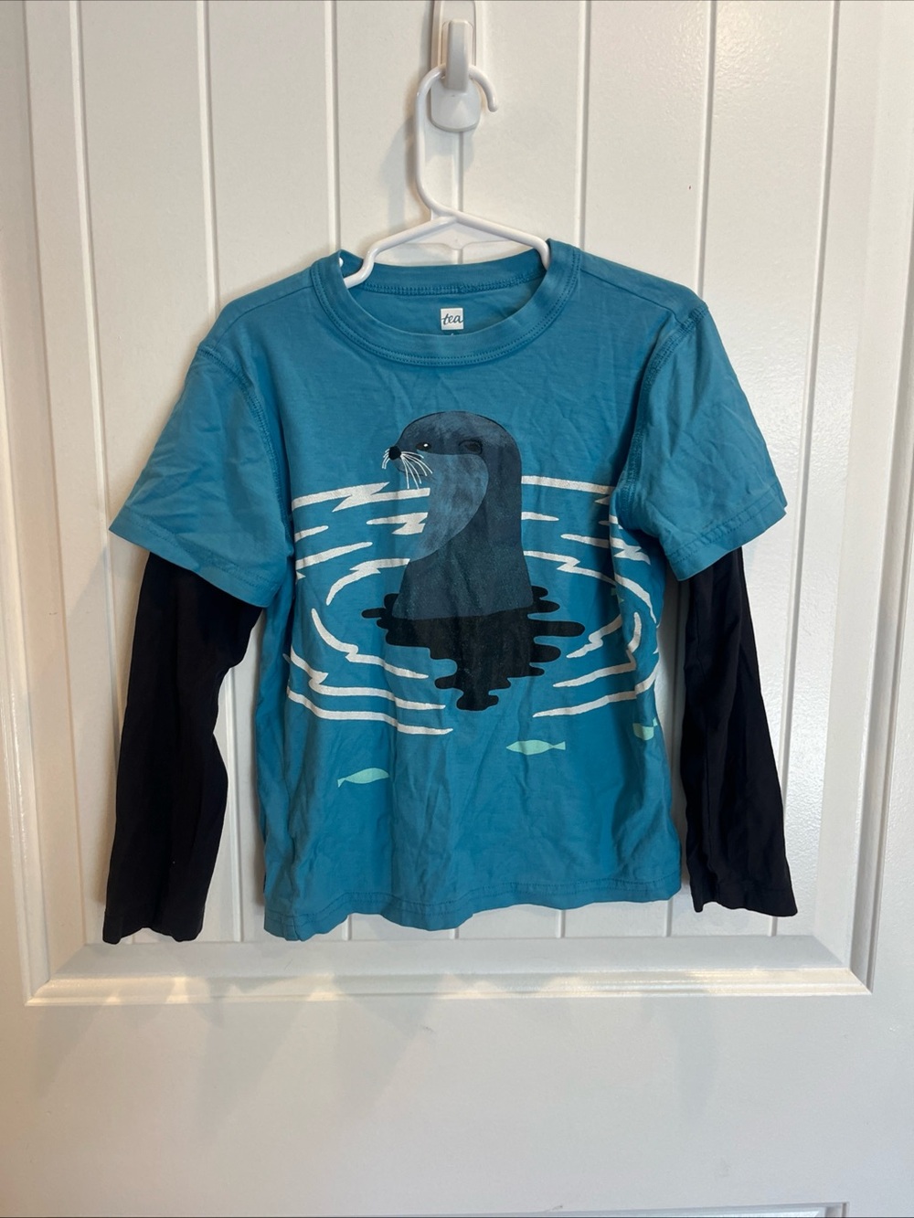 Tea Collection Teal Tee with Black Layered Sleeves and Seal Graphic